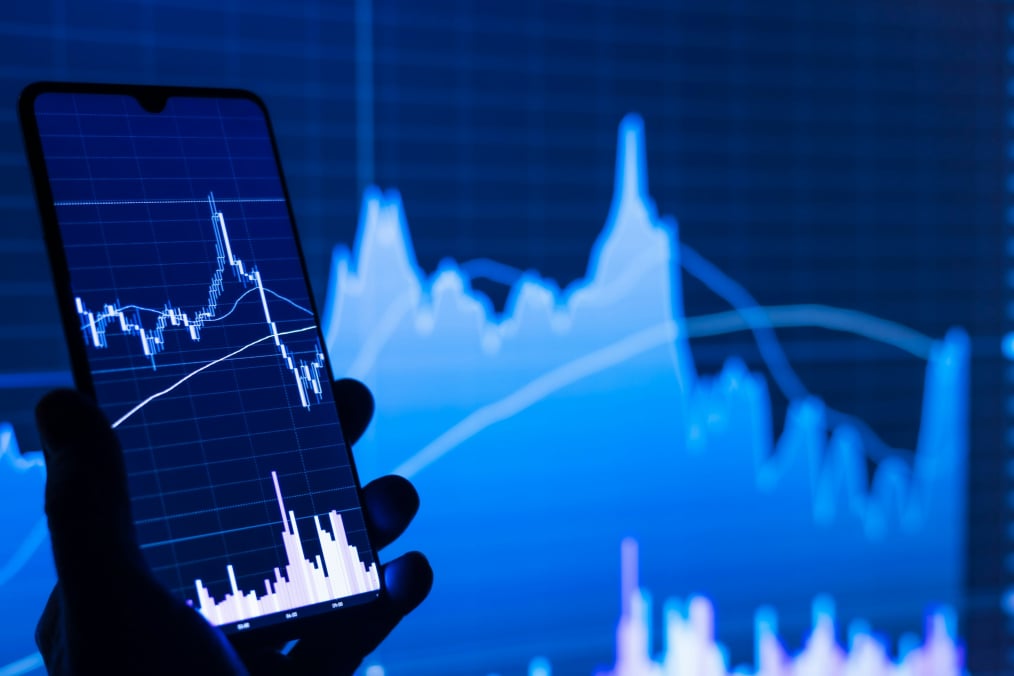 investing application and background in blue